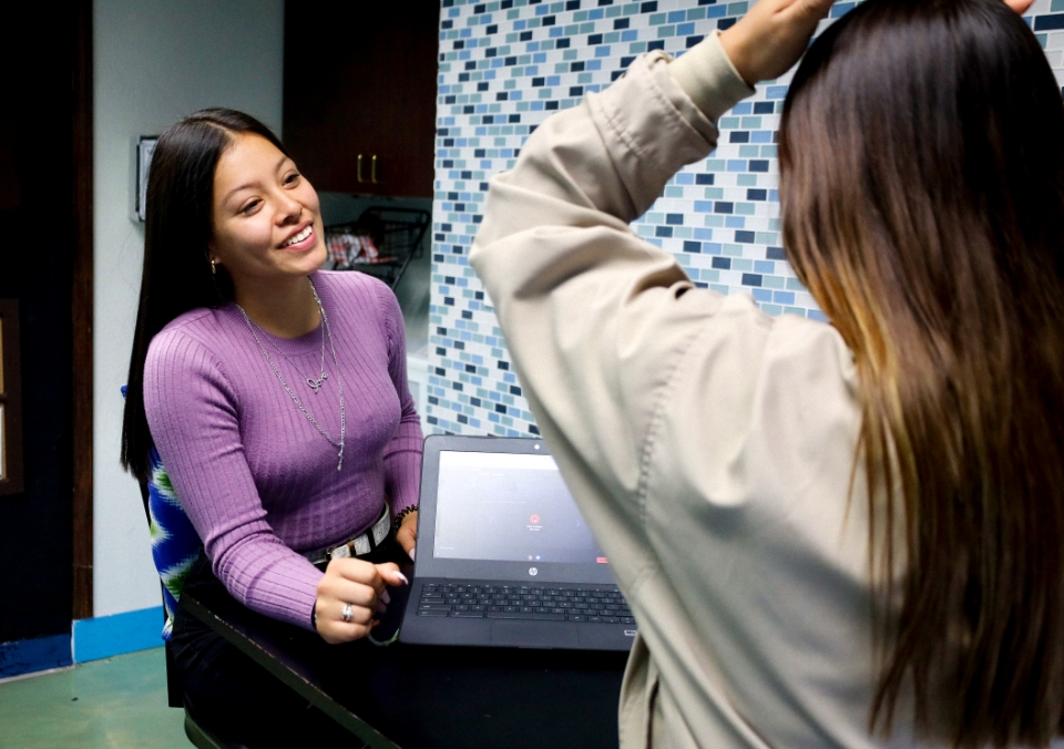 Student receiving in-person tutoring at a HUB location