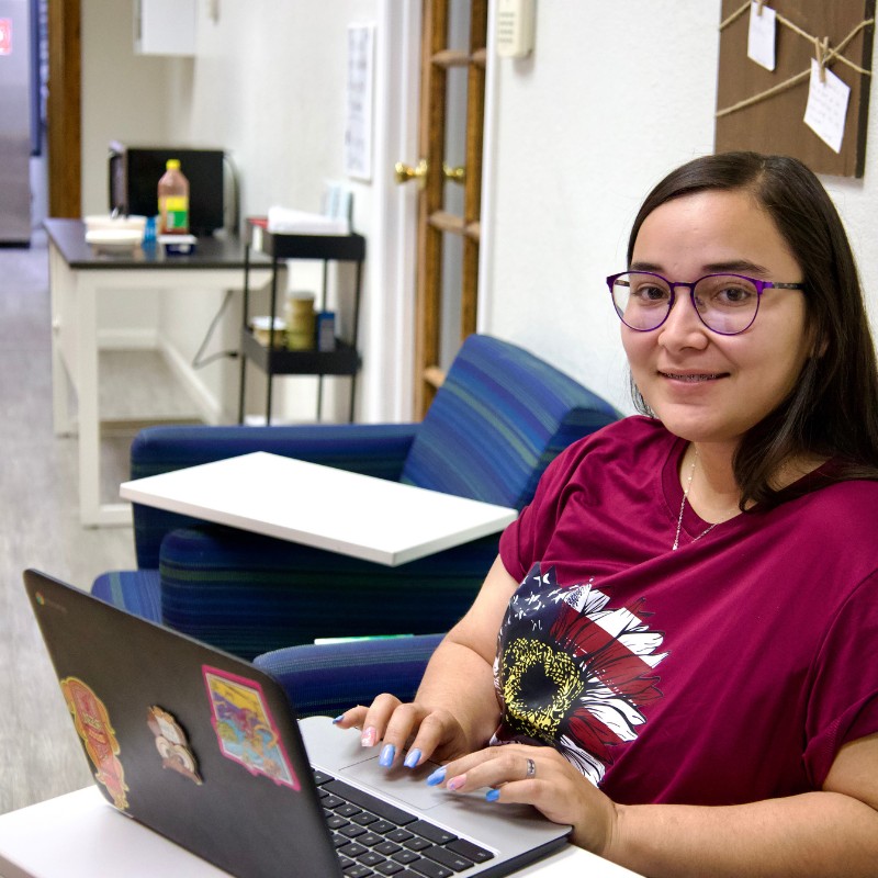 Student working in a study area at the Phoenix HUB