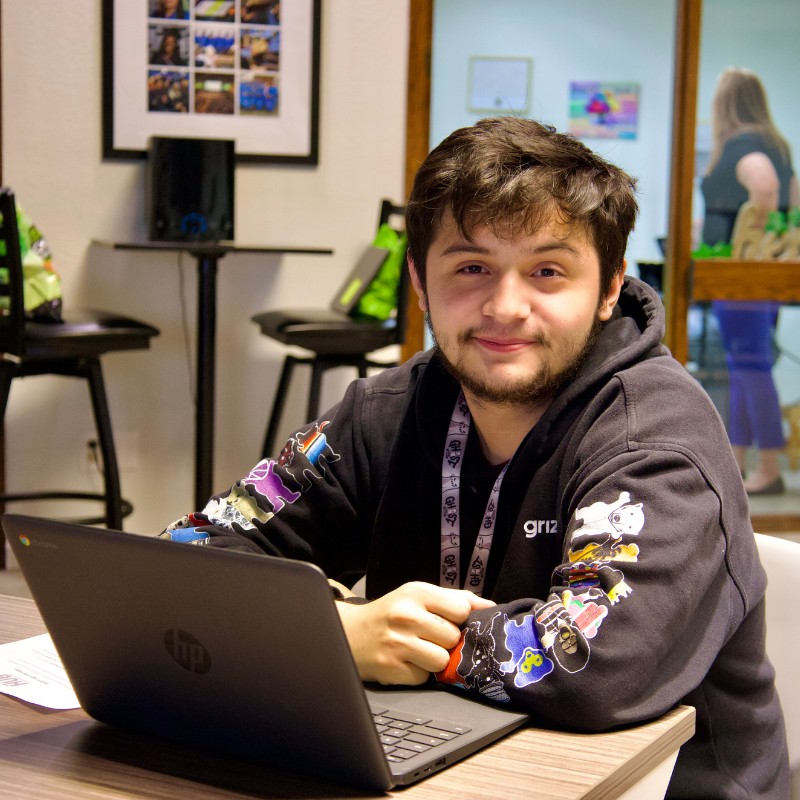 Student studying at the Phoenix HUB