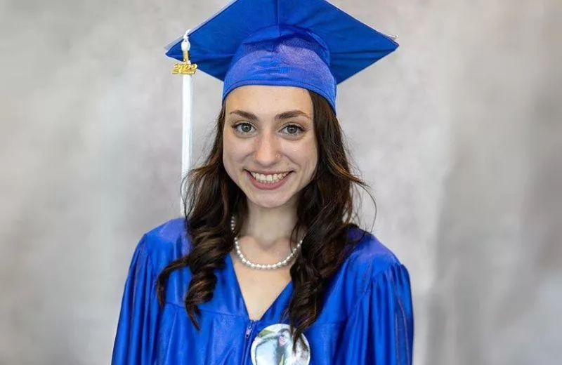 Student smiling on their graduation day