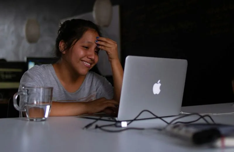 Mother taking an online class from home