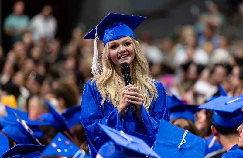 Graduate speaks to her friends and family during graduation ceremony