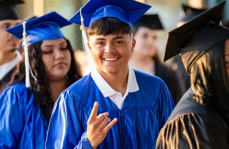 Man enjoying his high school graduation day