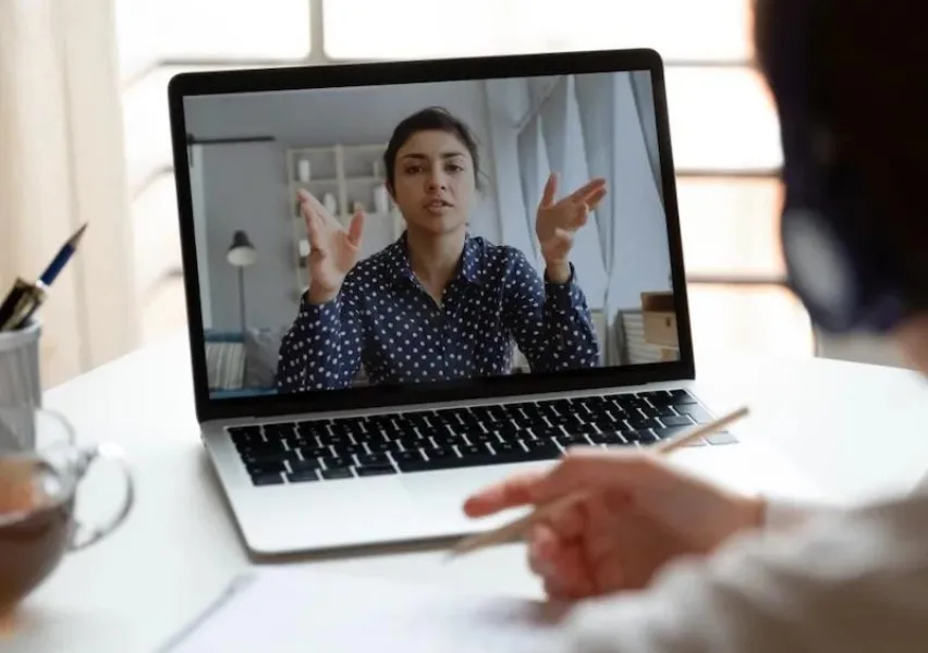 Students on a call with their teacher