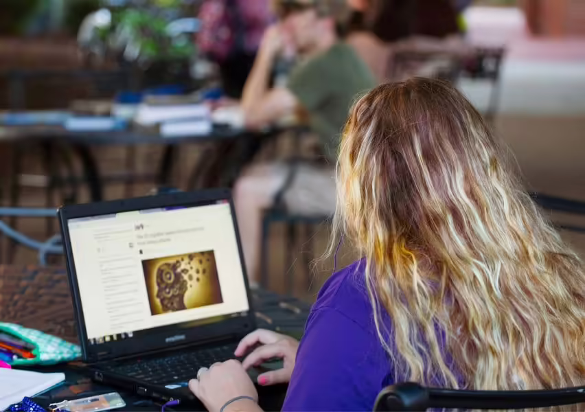 College athlete studying in a library